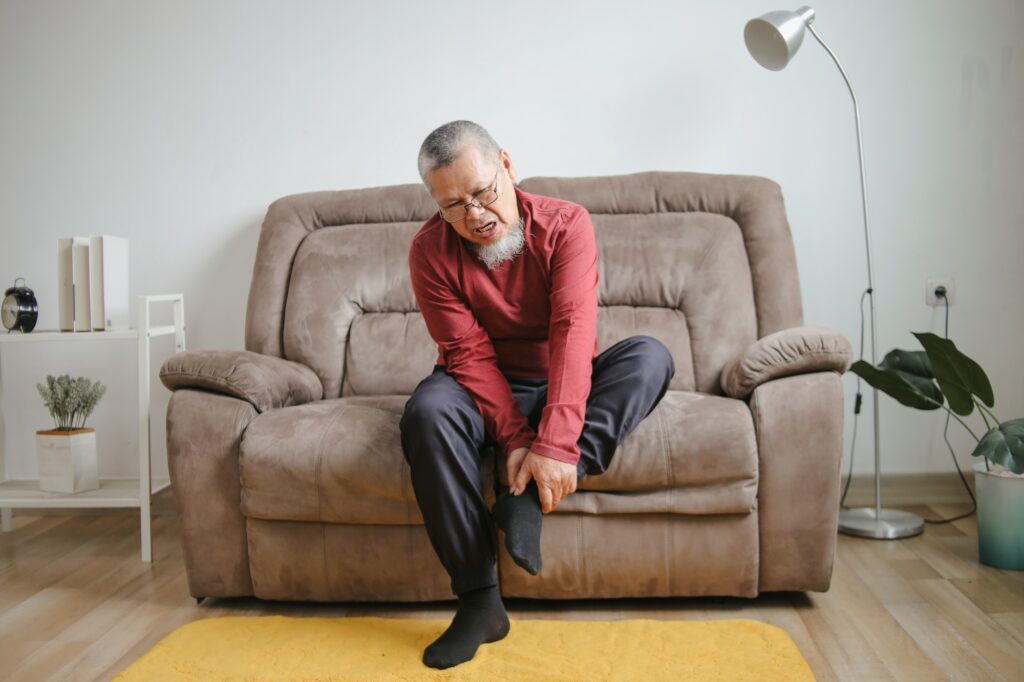 Man with foot pain seeking cryotherapy for nerve pain relief